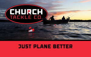 Boat trolling with Church Tackle Co planer boards, silhouetted against a beautiful sunset